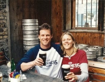 Man and woman drinking Guinness in Ireland.