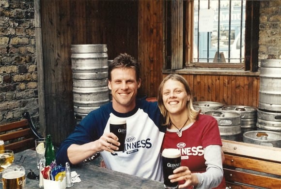 Man and woman drinking Guinness in Ireland.