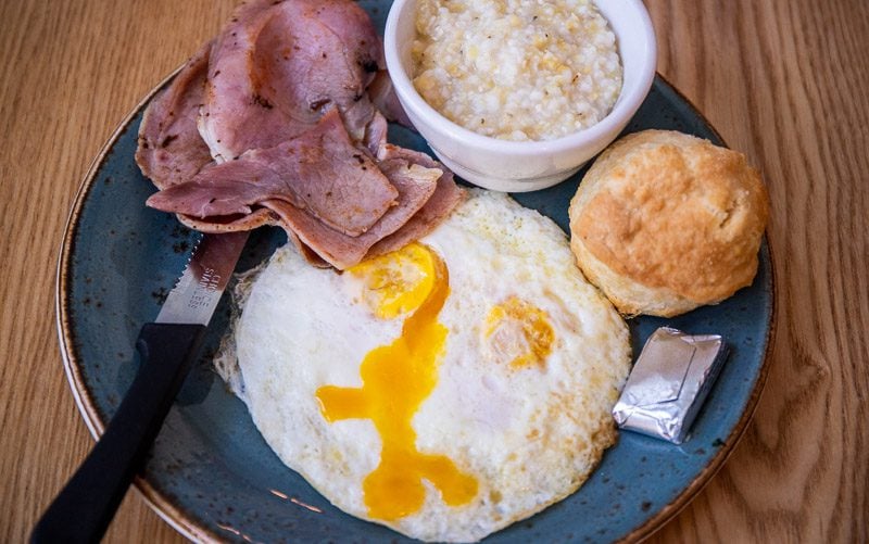 Country ham goes well with eggs, grits, and a biscuit