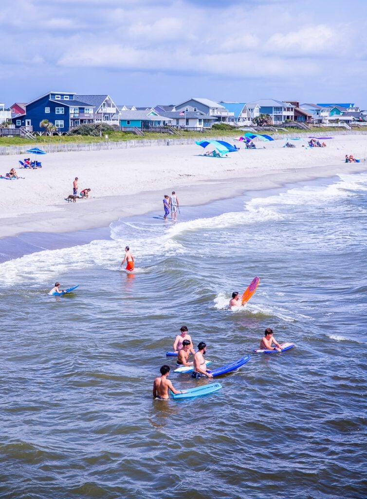 people swimming in Holden Beach, North Carolina