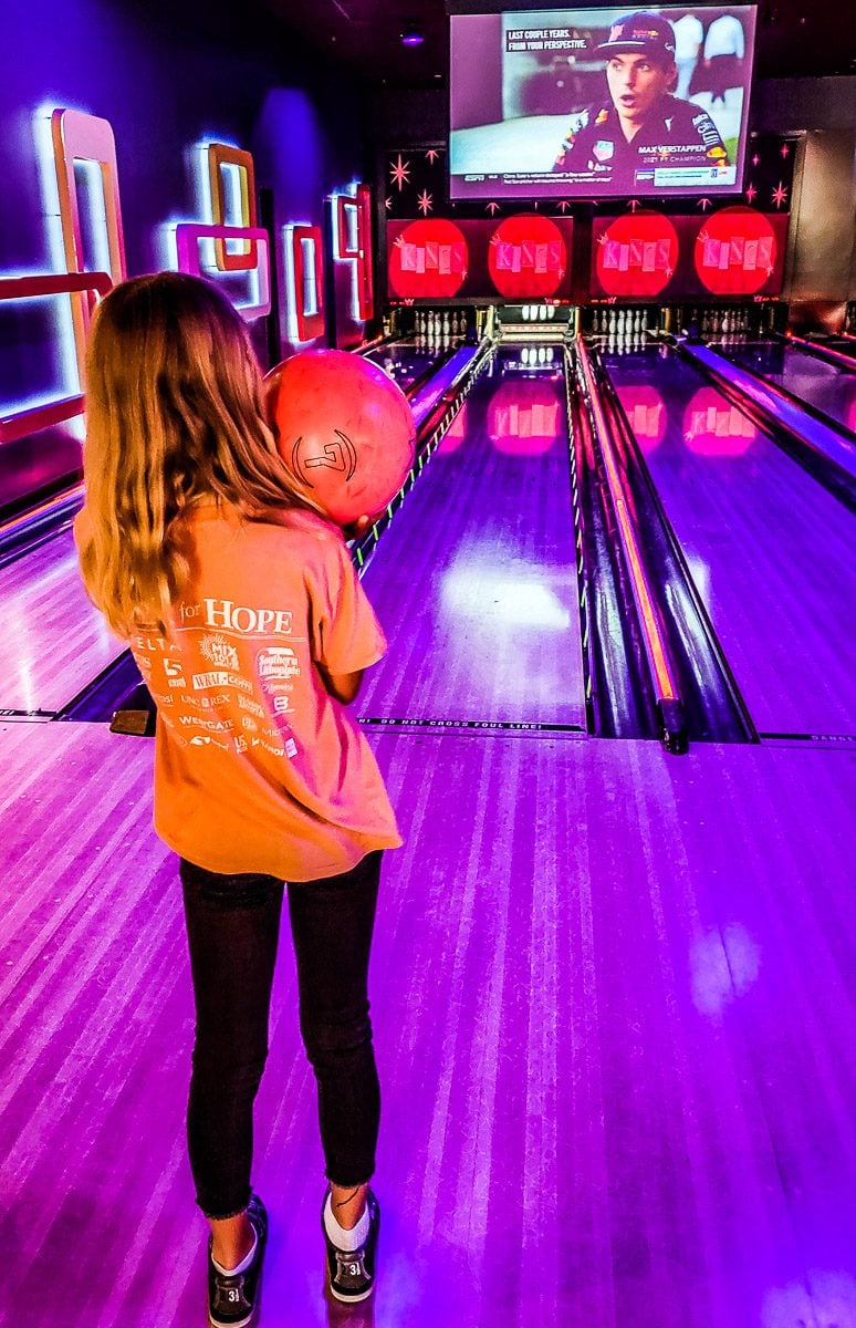 young girl Bowling at Kings, North Hills