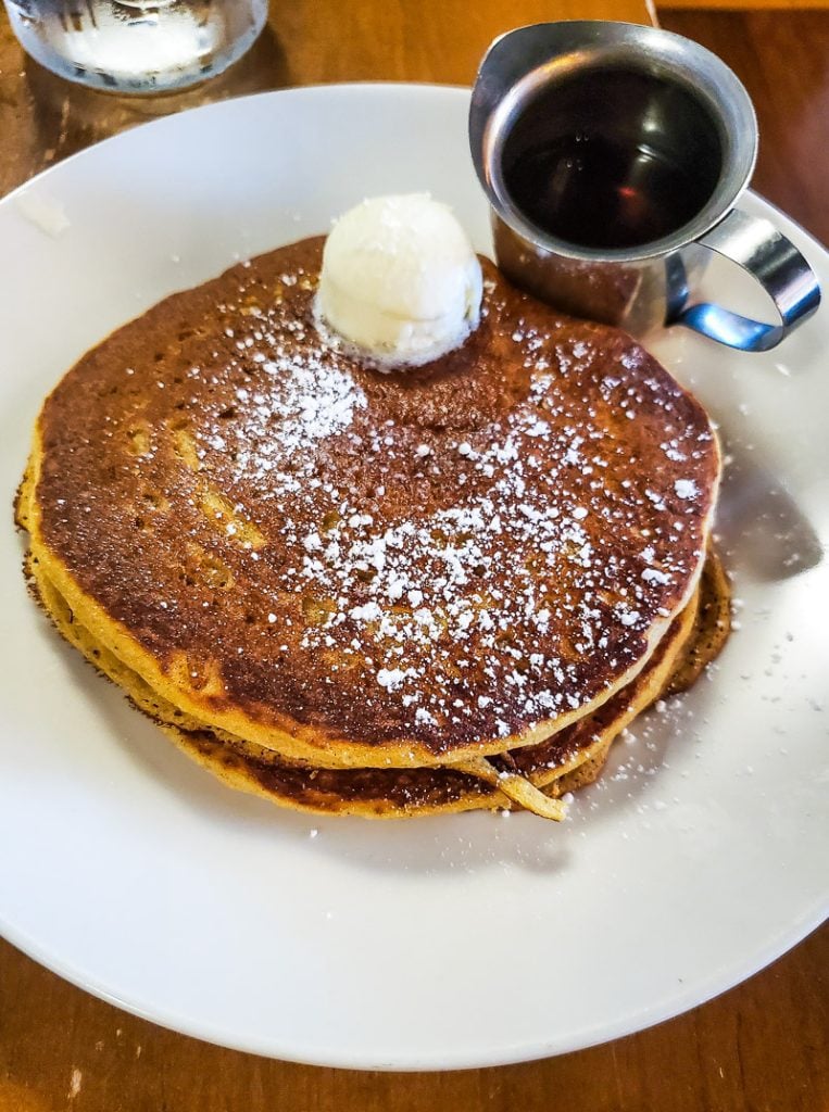 pancakes with syrup on a plate 