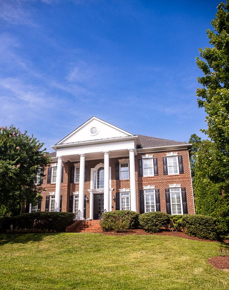 red brick home with columns in Cary, NC