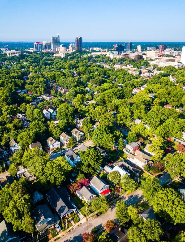 aerial view of Historic Oakwood, with Raleigh skyline in the background