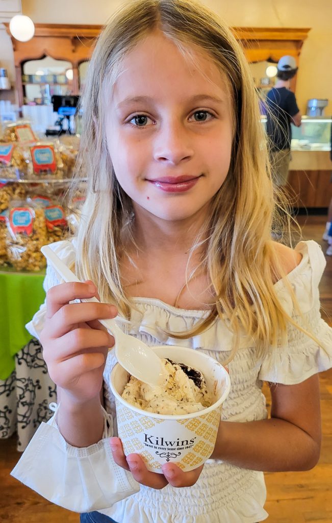 Girl eating an ice cream cup