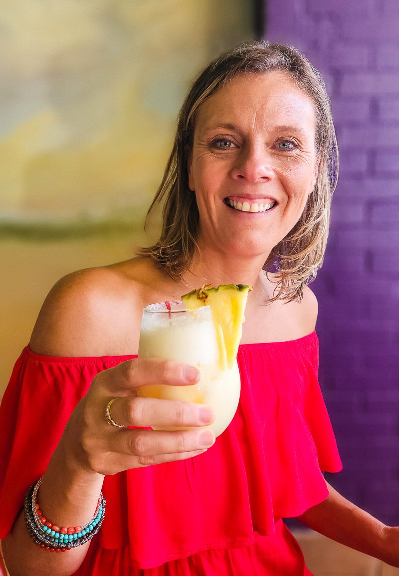 Lady drinking a cocktail