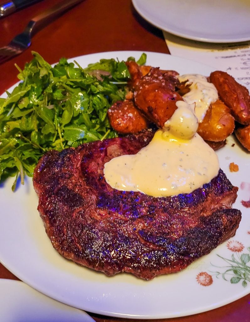 Ribeye steak, arugula and potatoes at the Stanbury Restaurant