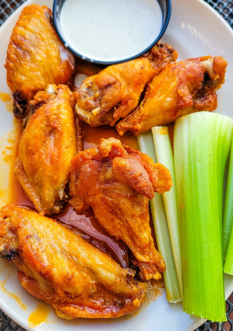 Wings and celery on a plate