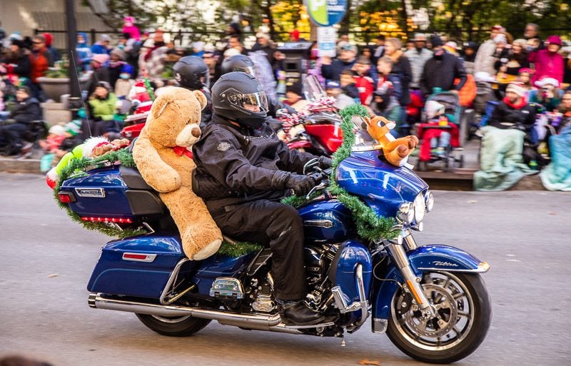 Motor bike with a giant teddy bear in a parade