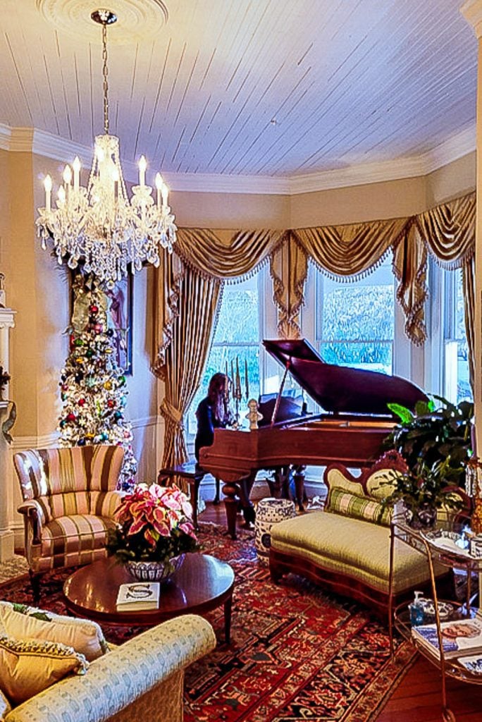 Piano and Christmas tree in a home