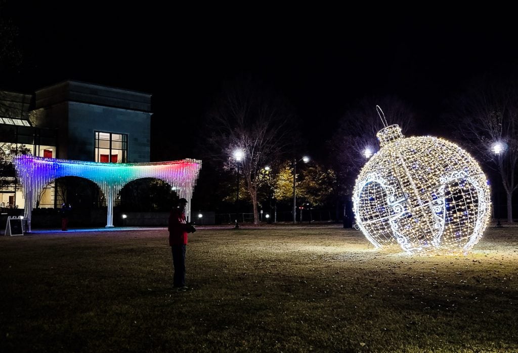 illuminated giant christmas ornament in park