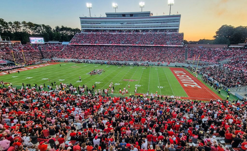 crowds watching an NC wolfpack game at carter finley