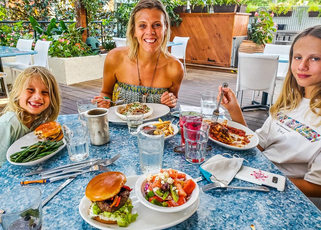 Mom and two daughters eating brunch at a Greek Restaurant