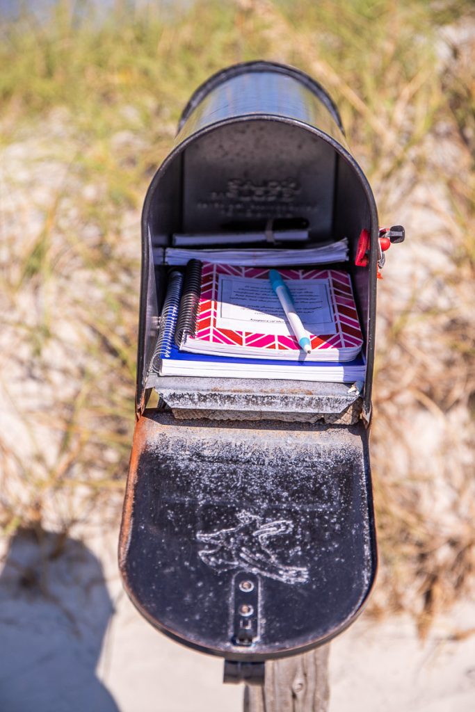 notebooks inside kindred spirit mailbox
