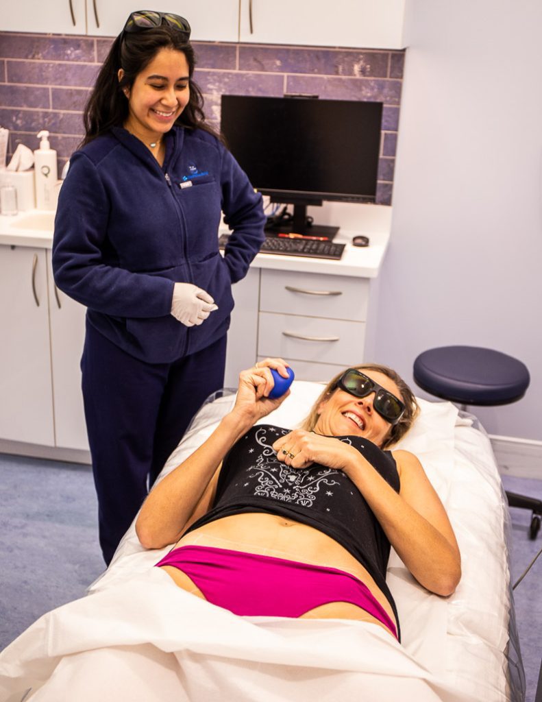 Lady receiving hair laser removal treatment