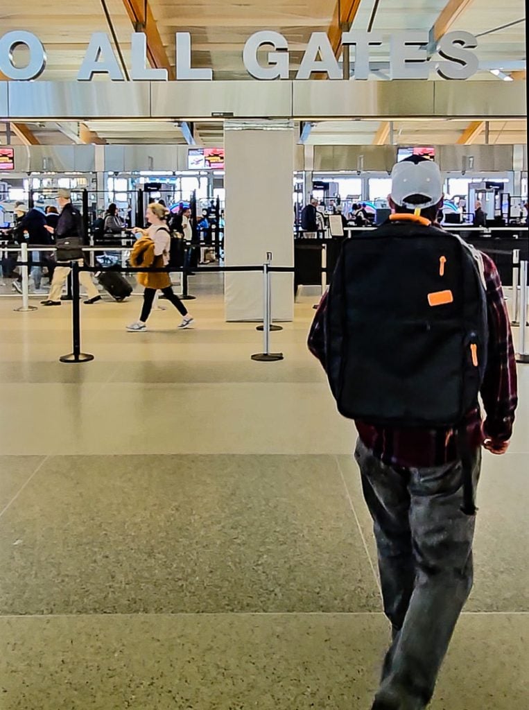 Man walking through airport