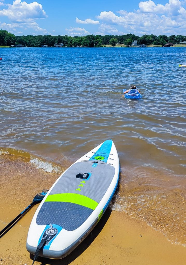 Paddle board on the edge of a lake