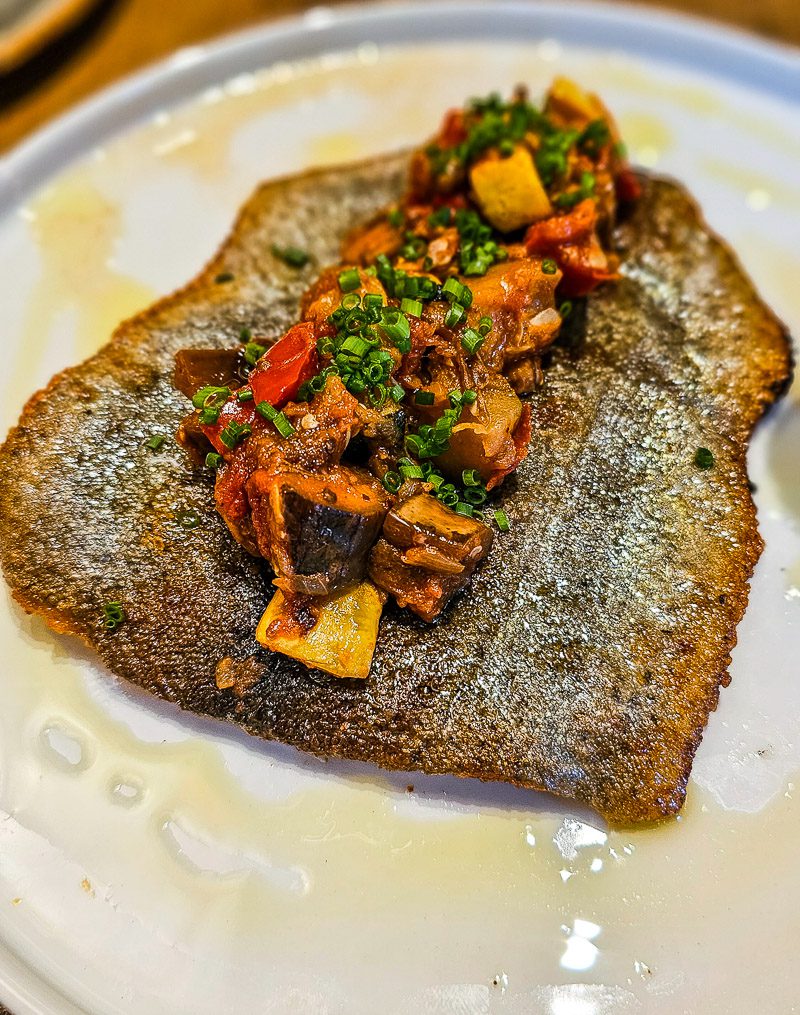 Serving of rainbow trout on a plate
