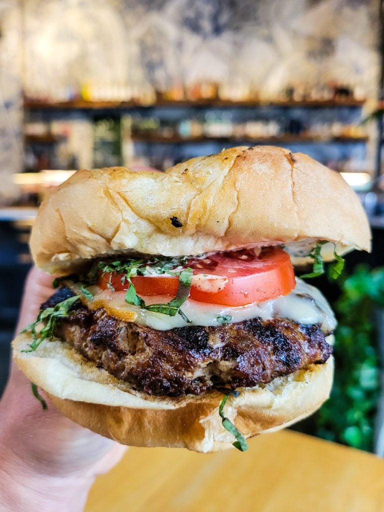 Lamb burger with lettuce and tomato