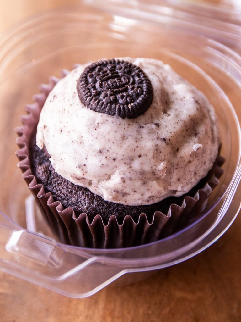 Chocolate cupcake with cream on top