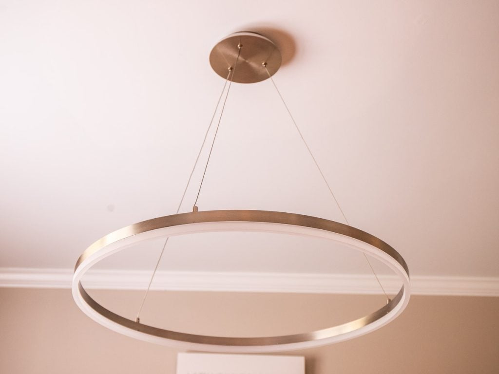 Circular chandelier hanging from ceiling
