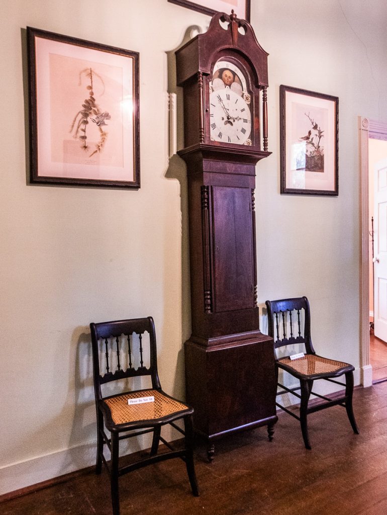 Antique clock and two chairs