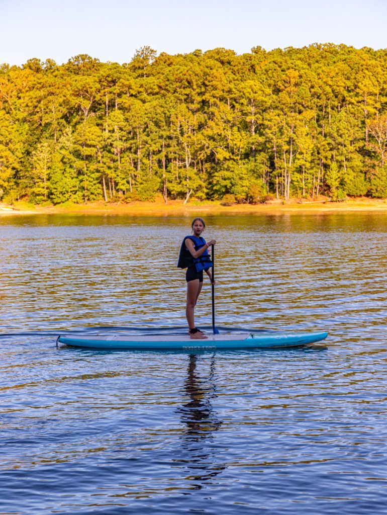 savannah on paddle board on lake