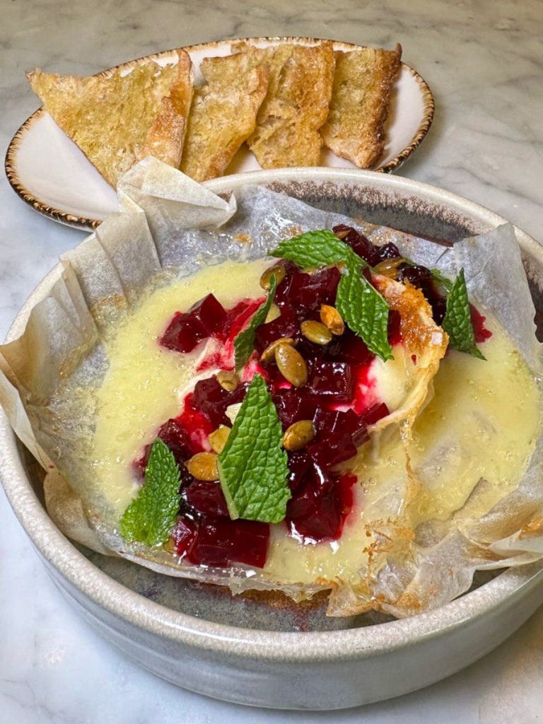 Baked Spanish Brie in a bowl.