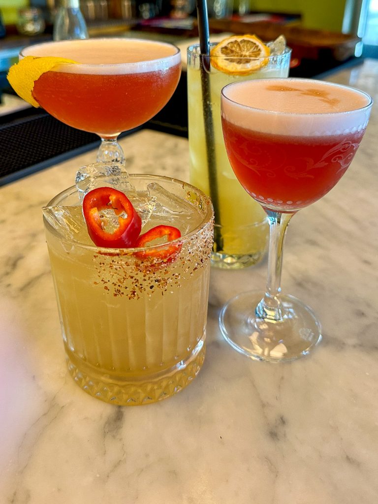 $ cocktails on a bar.