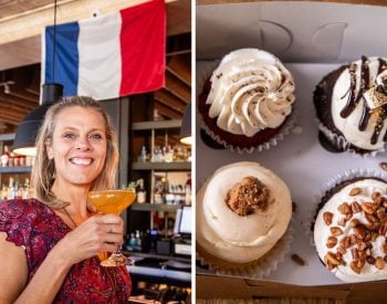 Woman holding a cocktail glass next to 4 cupcakes.