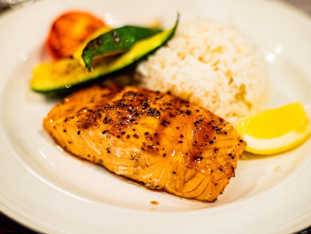 salmon on plate with rice