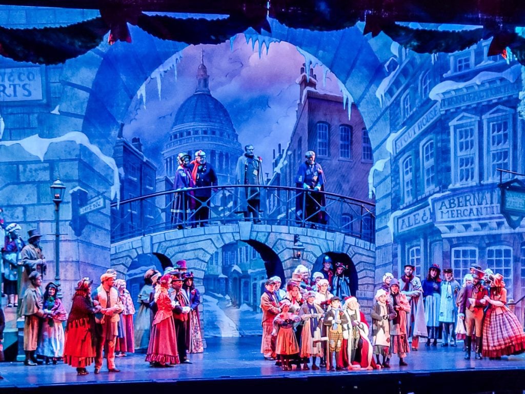 A Christmas carol play in a theater.