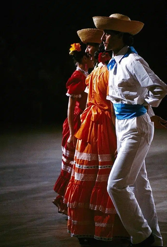 a line of folkmoot dancers in costume