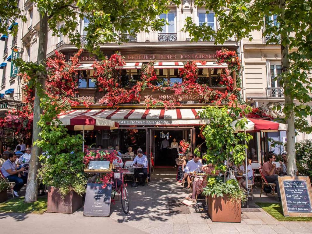 flowered covered cafe in paris