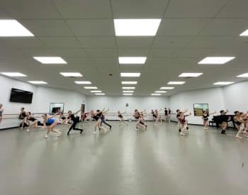 Ballet dancers practicing in a studio for Cary Ballet.