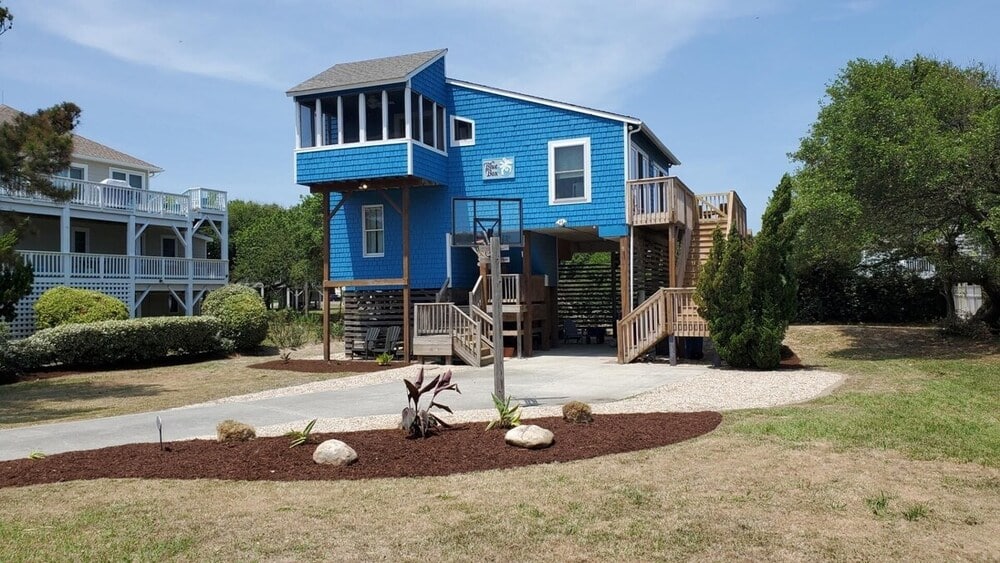 blue two story unique beach house rental