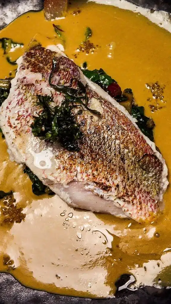 Fish curry in a bowl.