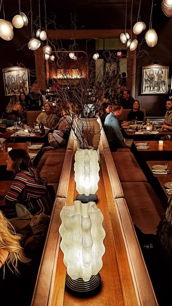tabels at madre restaurant with lanterns