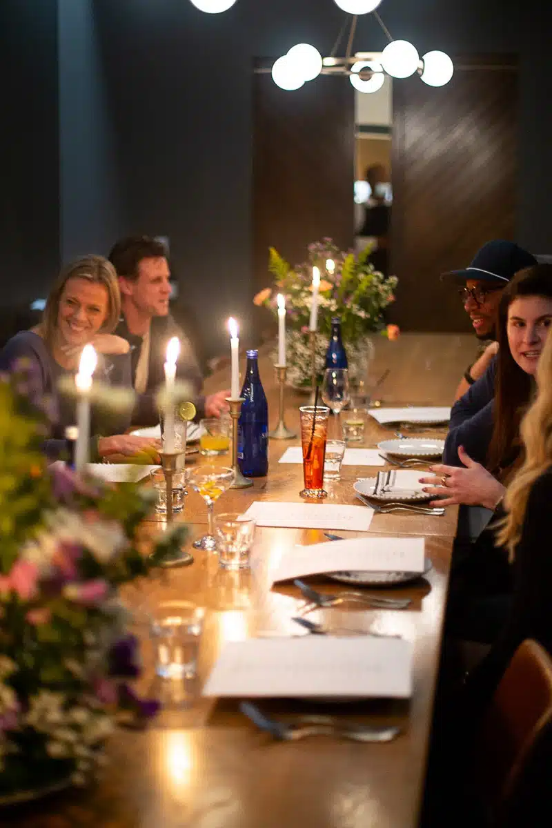 friends laughing at cucciolo restaurant table