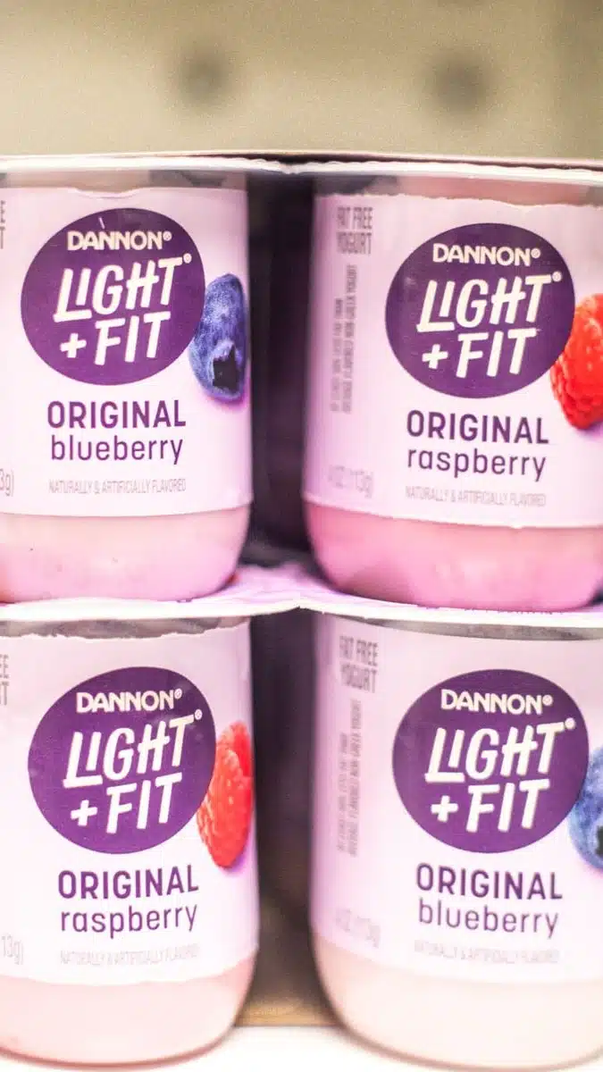yoghurt on fridge shefl