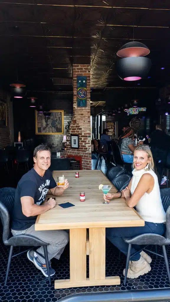 couple enjoying a drink at quantum toad