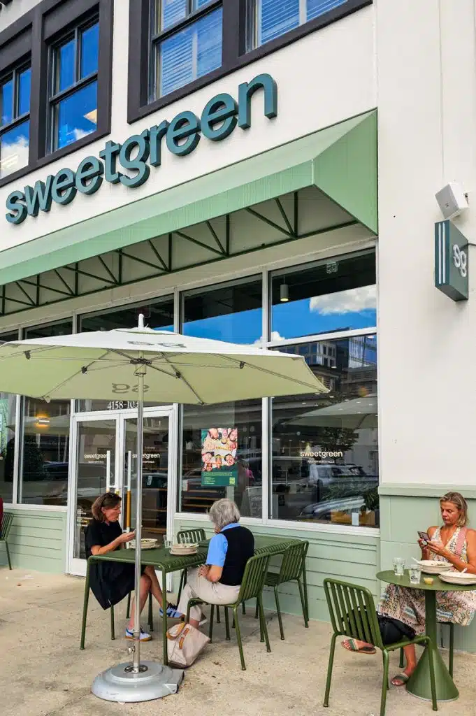 sweetgreen patio with people eating lunch