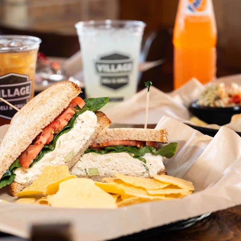 chicken salad sandwich from village deli on table