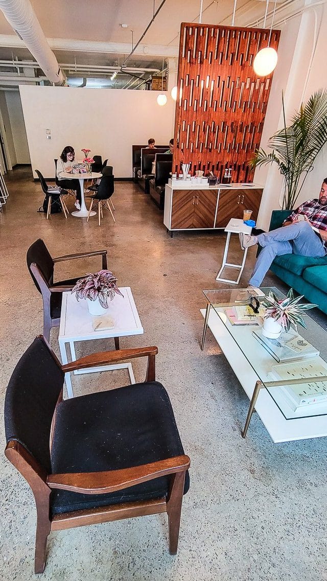 People sitting in a coffee shop - Idle Hour Coffee Shop, Raleigh