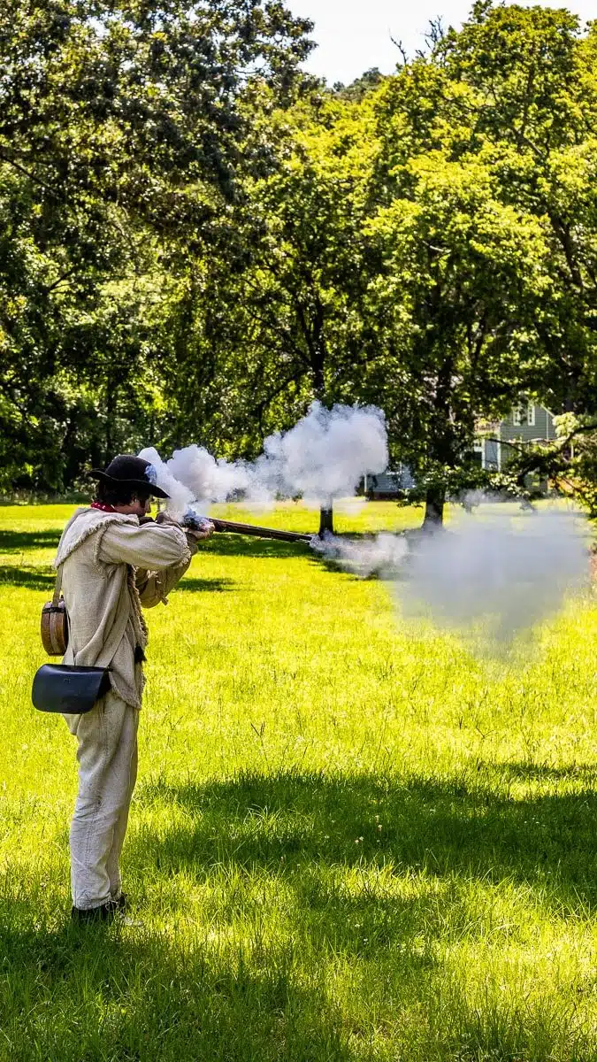 man firing musket