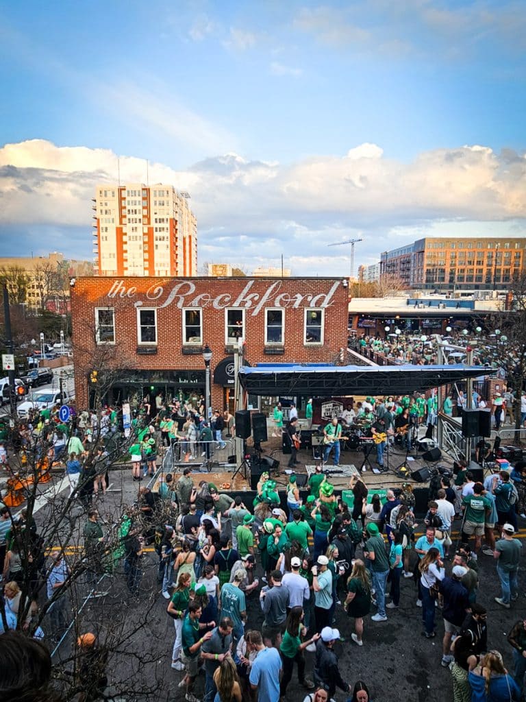 crowds on glenwood ave in front of hibernian for st patrick's DAy