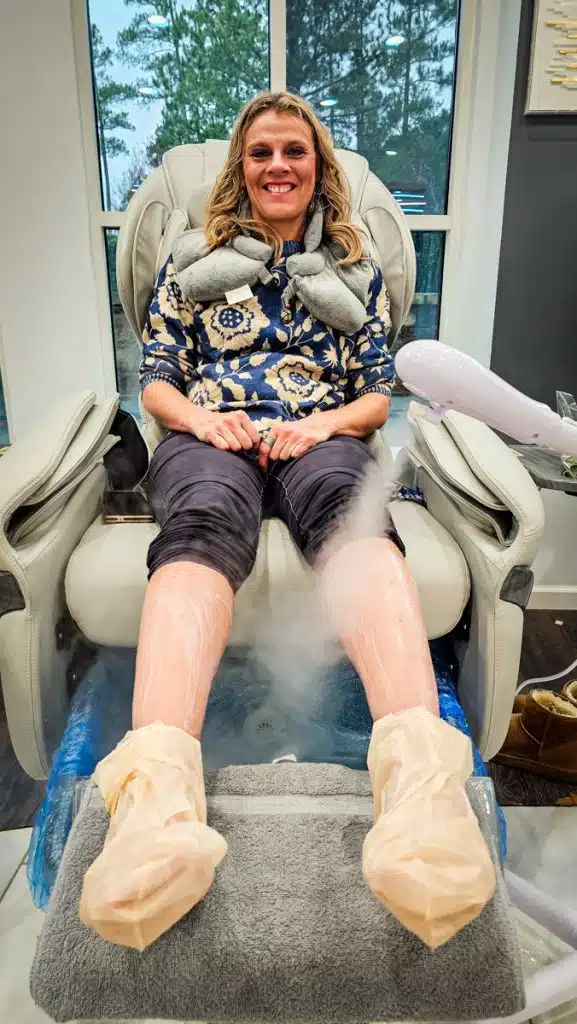 woman sitting in pedicure chair