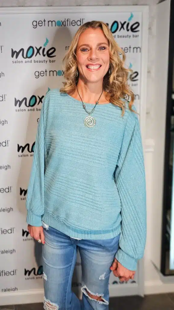 woman posing with moxie hair style