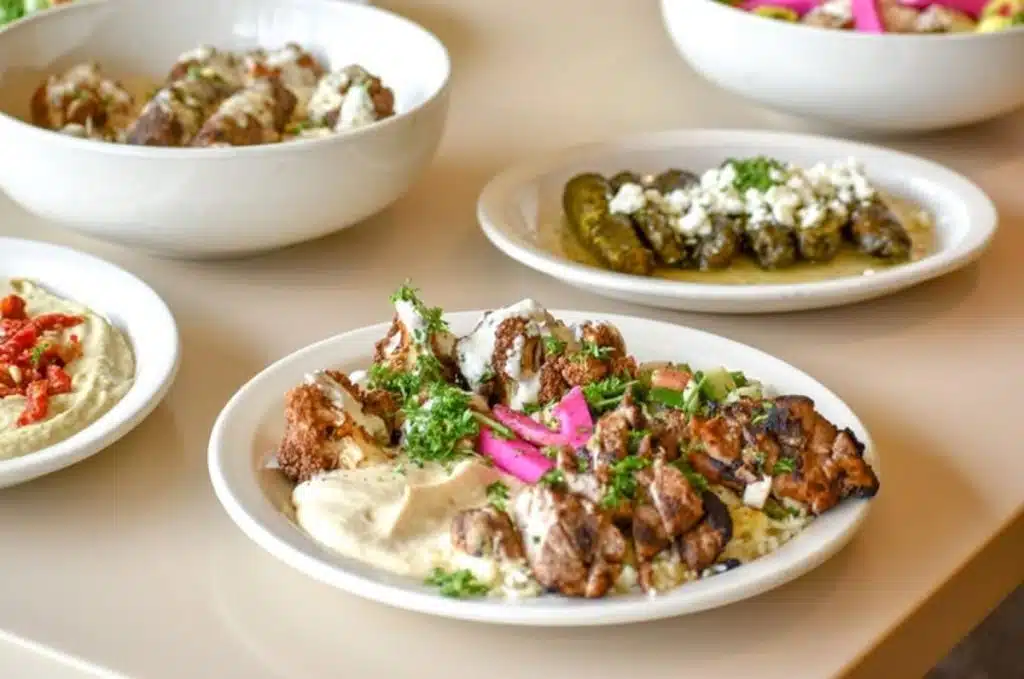 table of Mediterranean dishes at Alladins