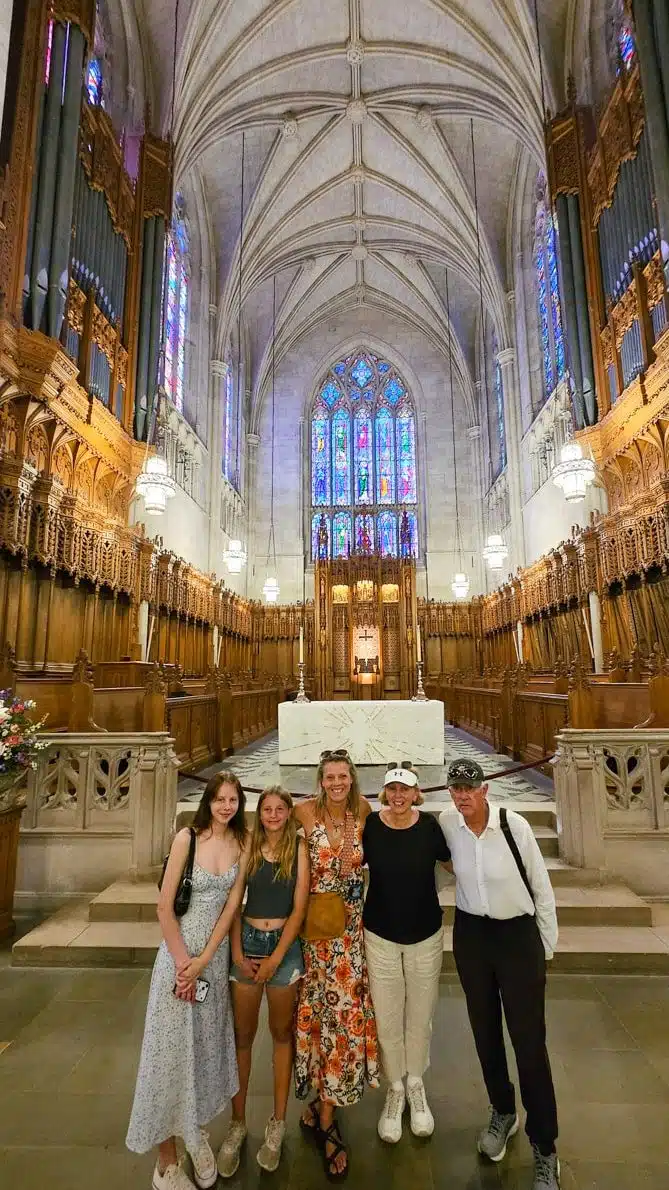 family posing inside Duke Chapel